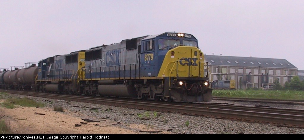 CSX 8779 leads a southbound train past Charlie Baker